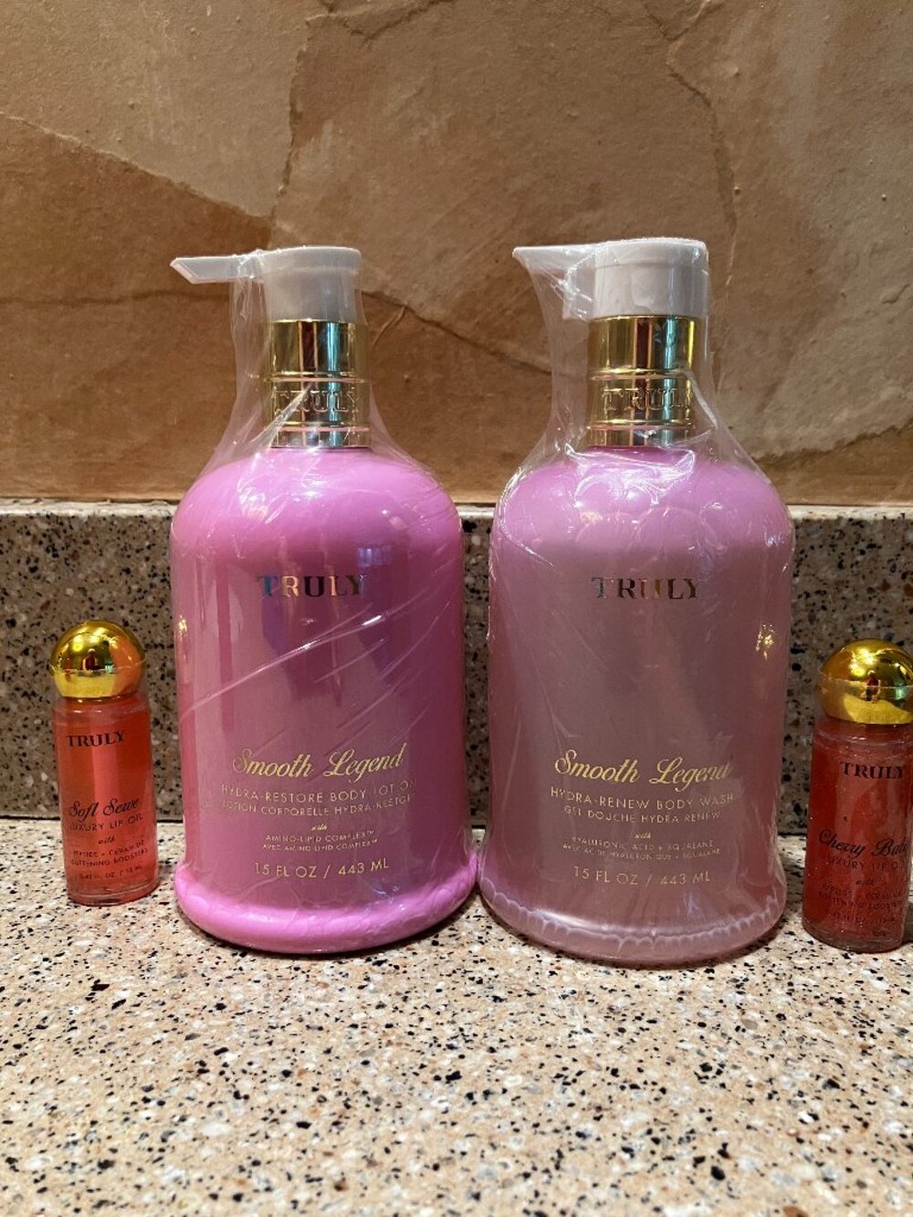 TRULY Set of Smooth Legend Hydrating Body Lotion and Body Wash with 2 Lip Oils!